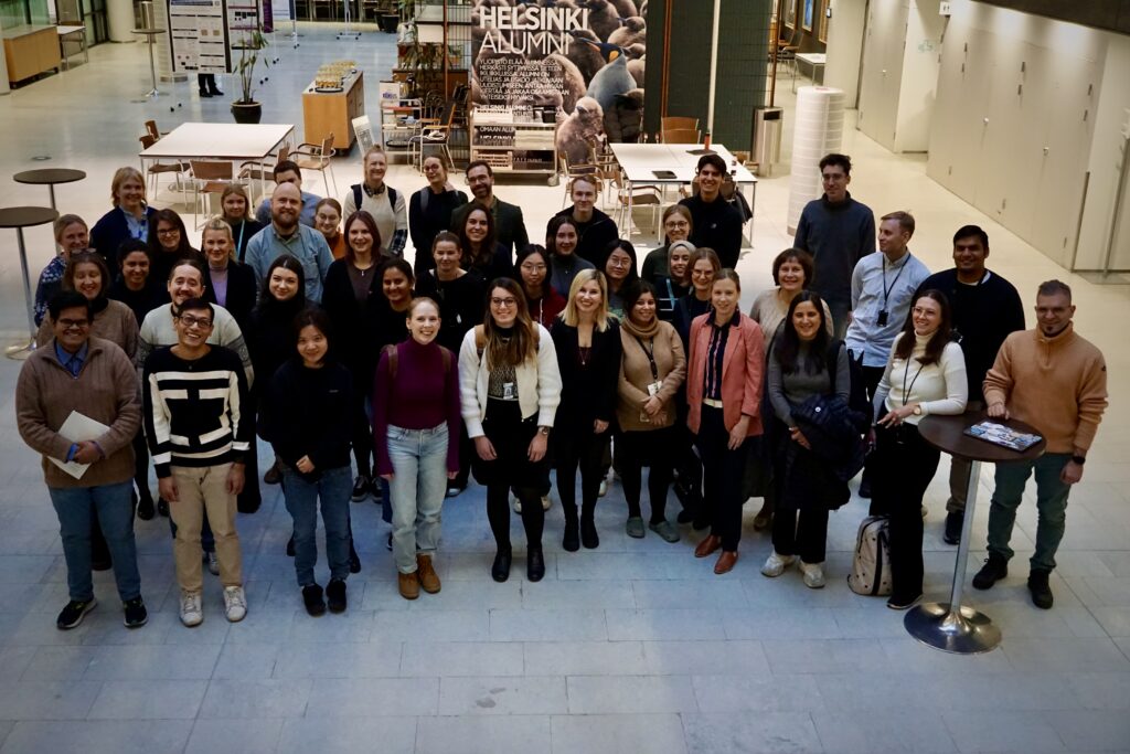 Group photo of people in a lobby